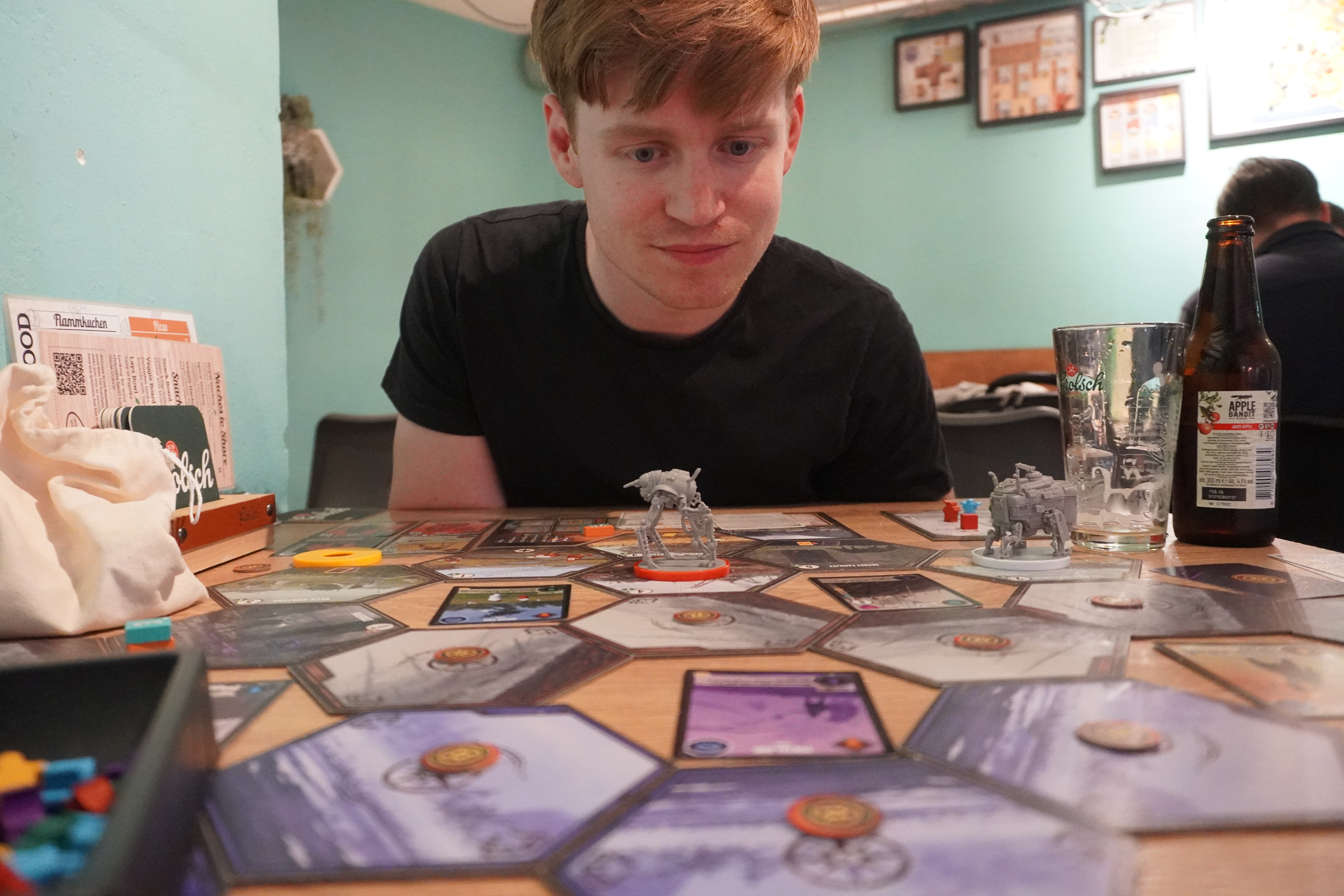 Simon playing a board game